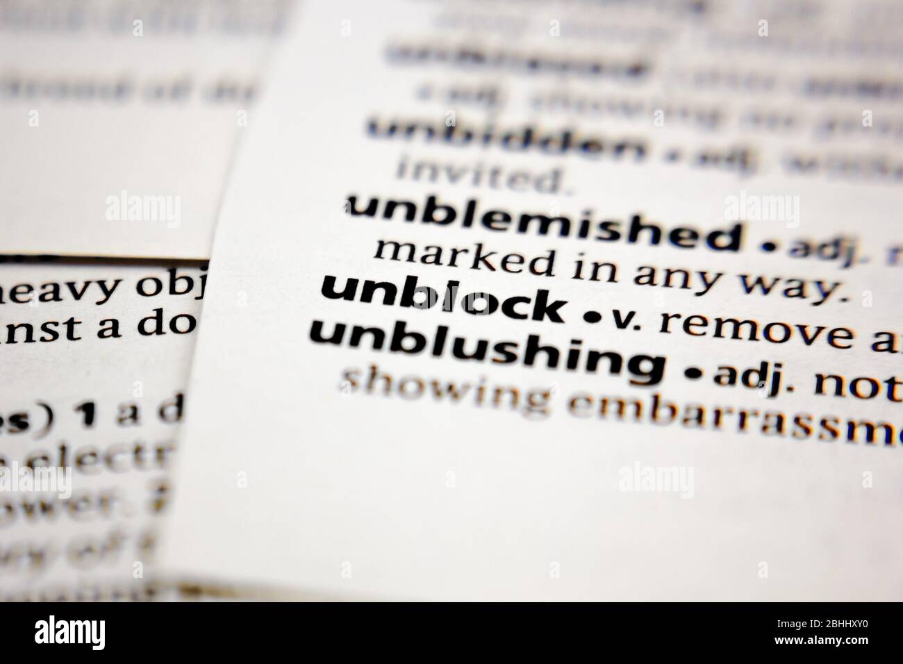 Word or phrase unblock in a dictionary. Stock Photo