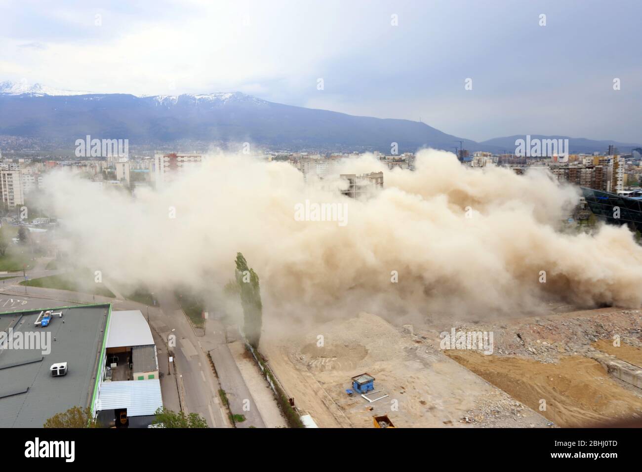 Controlled explosion with blasts of a big building, printing press house IPK Rodina, in Sofia, Bulgaria on 04/26/2020. Stock Photo