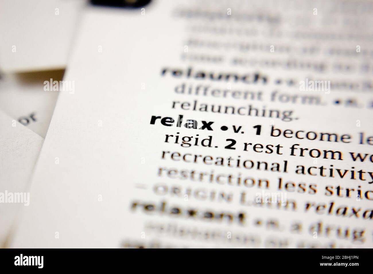 Word or phrase relax in a dictionary Stock Photo Alamy