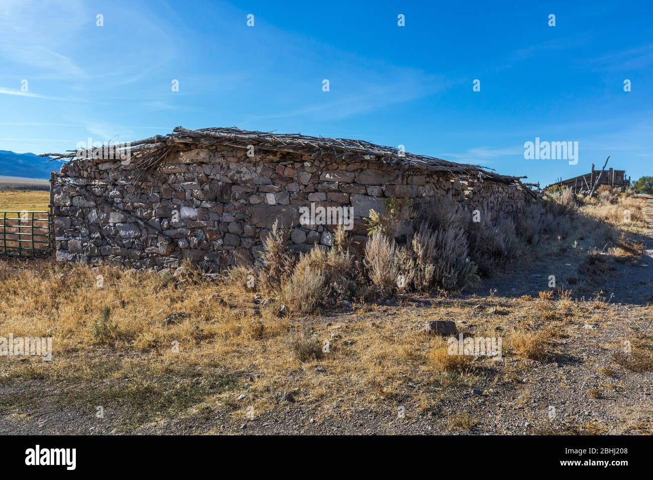 Stone barn with adjacent corral at a ranch in central Nevada, USA {No property release; available for editorial licensing only] Stock Photo