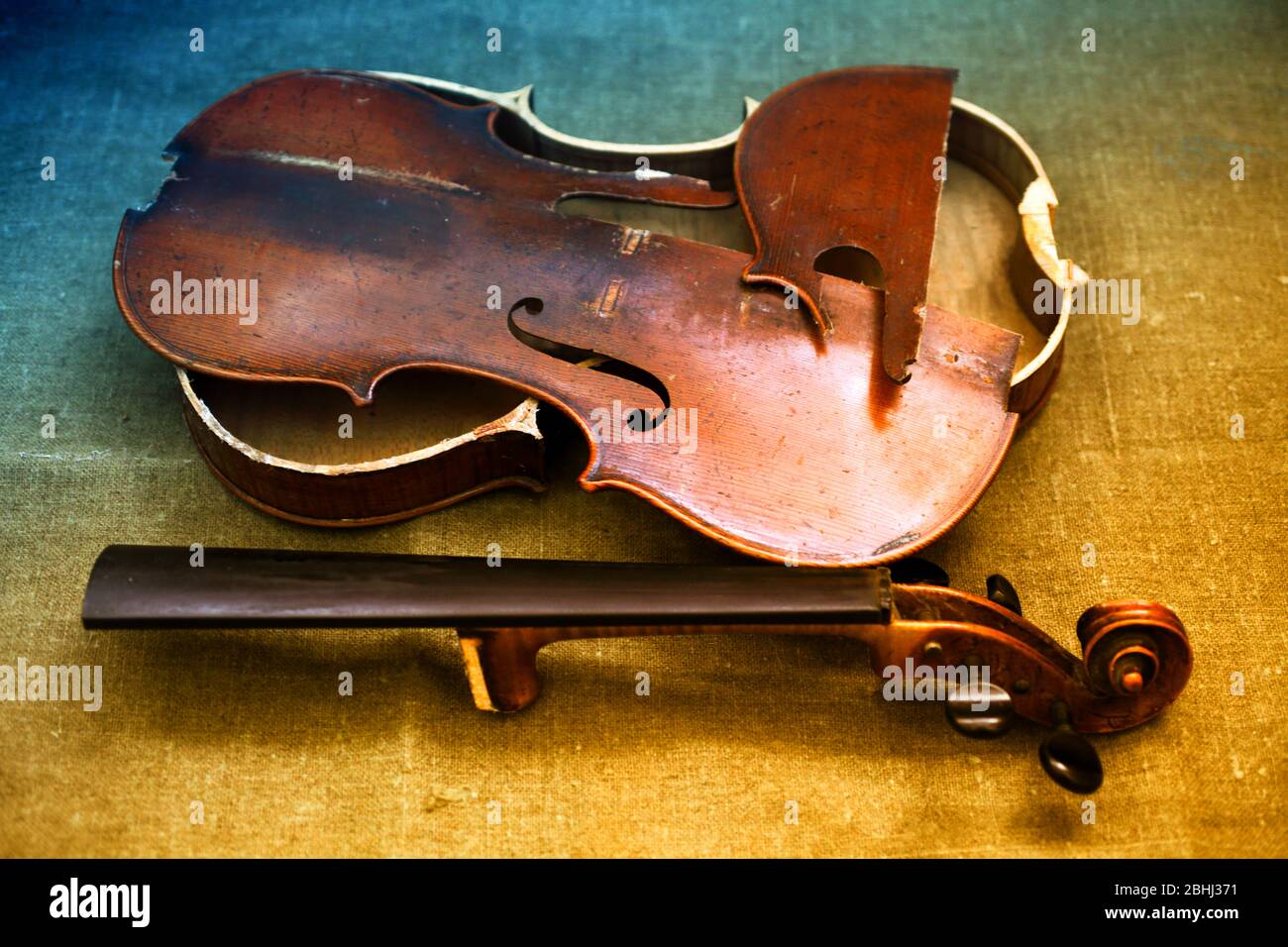 Old broken violin, rainbow tinted Stock Photo - Alamy