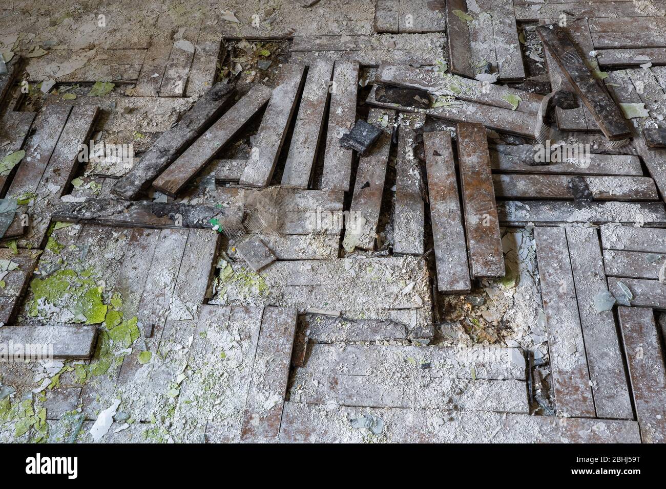 Old damaged floor in an abandoned building room, very dirty wooden ...