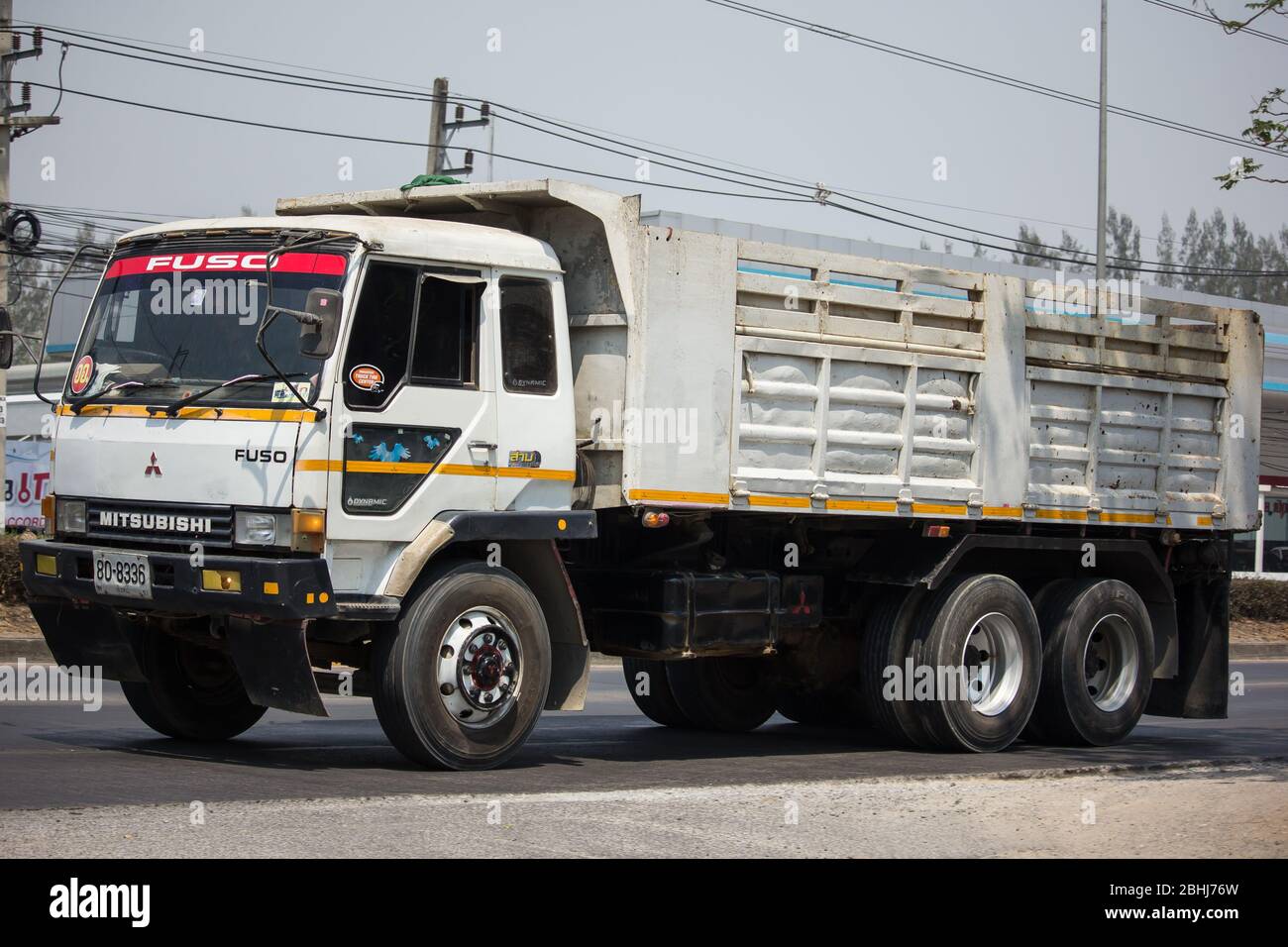 Chiangmai, Thailand - March  24 2020:  Private Mitsubishi Fuso  Dump Truck.  Photo at road no.121 about 8 km from downtown Chiangmai, thailand. Stock Photo