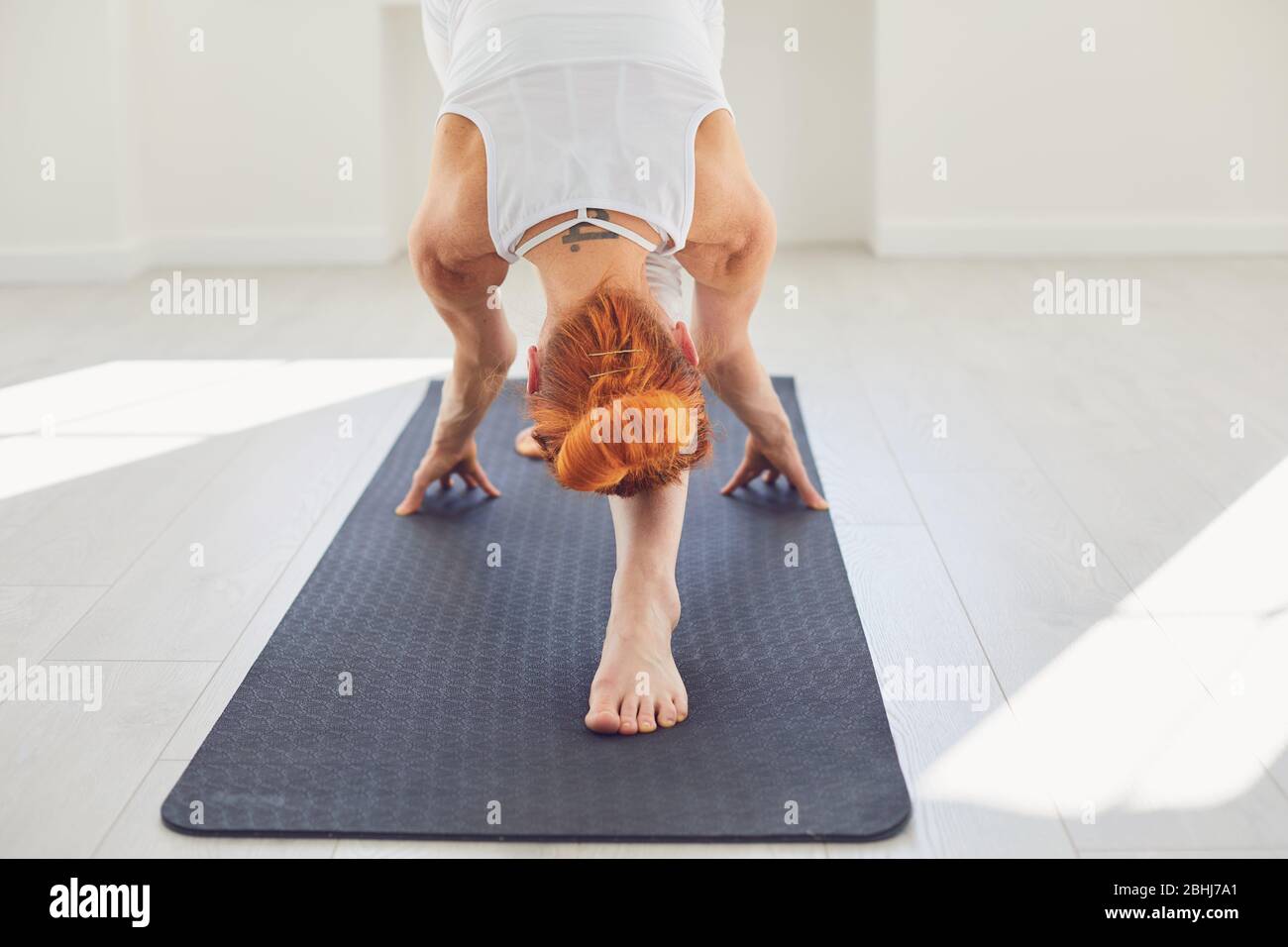 Yoga forward bend hi-res stock photography and images - Alamy