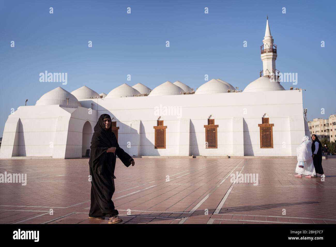 Jeddah / Saudi Arabia - January 16, 2020: Muslim woman after prayer in square next to Jaffali mosque in Jeddah Stock Photo