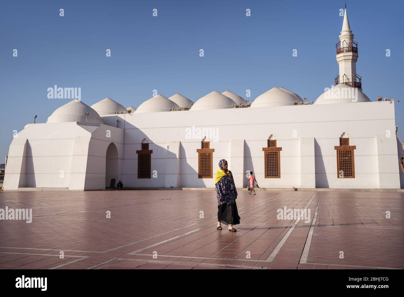 Jeddah / Saudi Arabia - January 16, 2020: Muslim woman after prayer in square next to Jaffali mosque in Jeddah Stock Photo