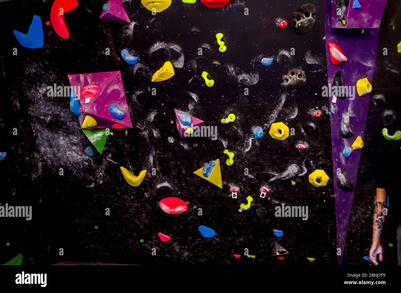 Rock climbing training wall. Extreme sports. Leisure and physical