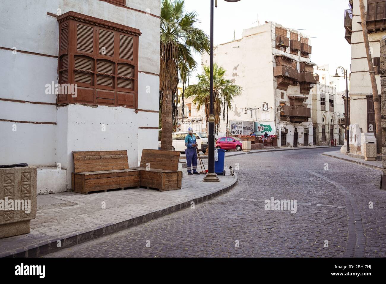 Jeddah / Saudi Arabia - January 16, 2020: street sweeper working on the streets of the historic center of Al-Balad, Jeddah Stock Photo