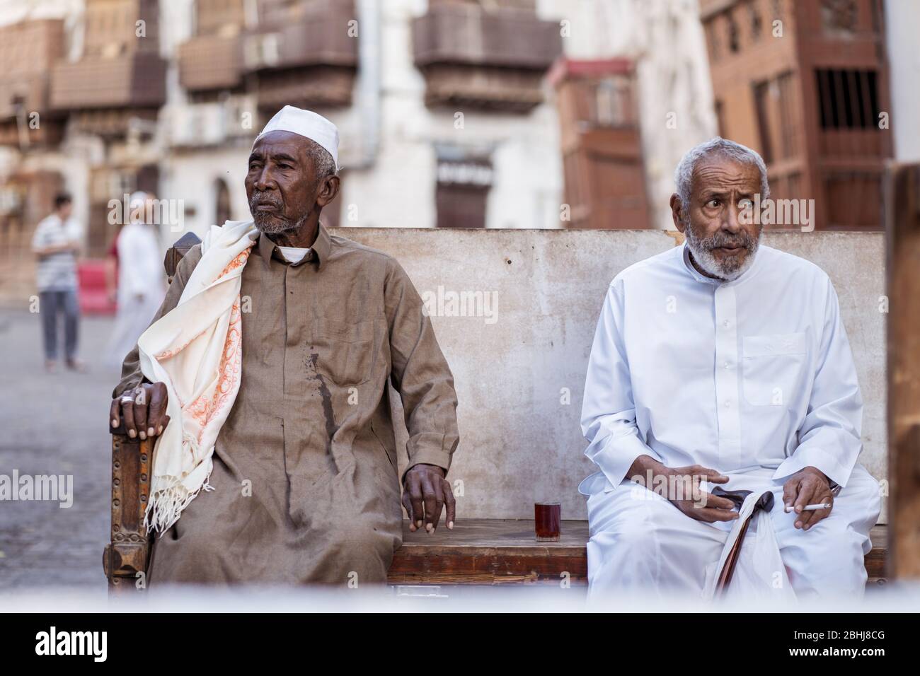 Jeddah / Saudi Arabia - January 16, 2020: portrait of famous traditional carpenter in Al-Balad drinking tea in the streets of downtown Jeddah Stock Photo