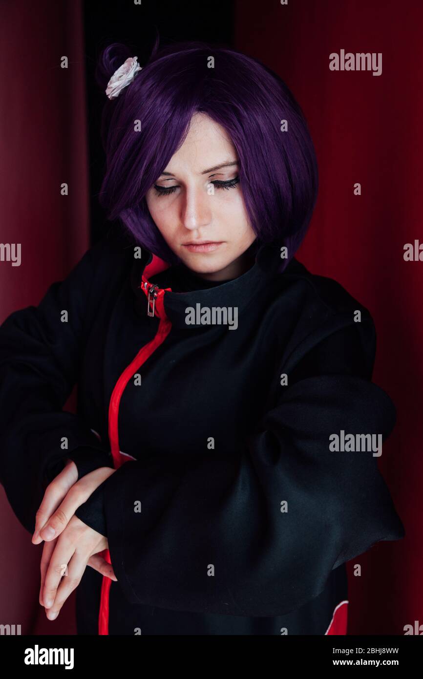 woman anime cosplayer with purple japan hair Stock Photo - Alamy