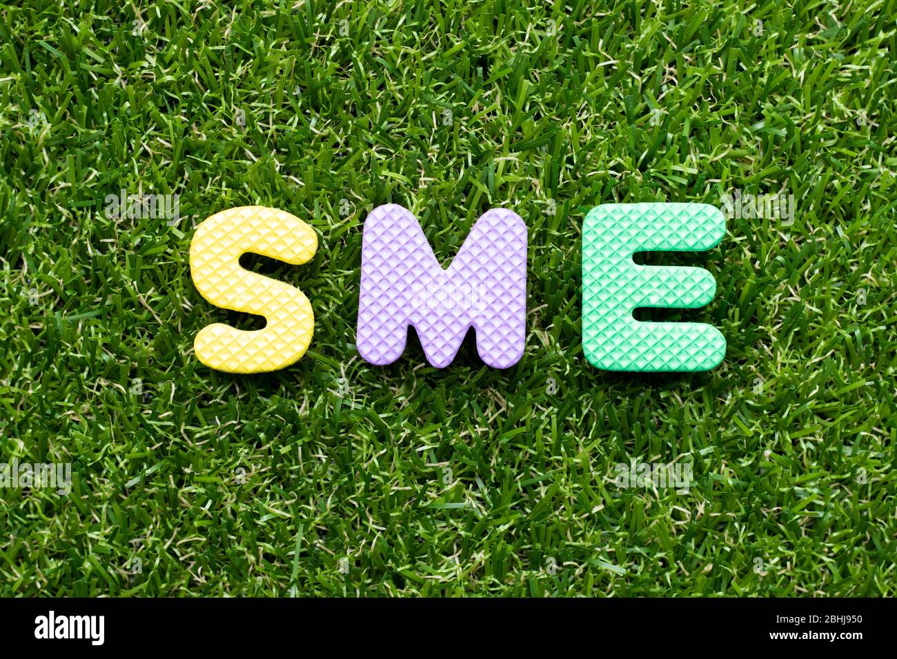 Toy foam letter in word SME (abbreviation of Small and medium sized