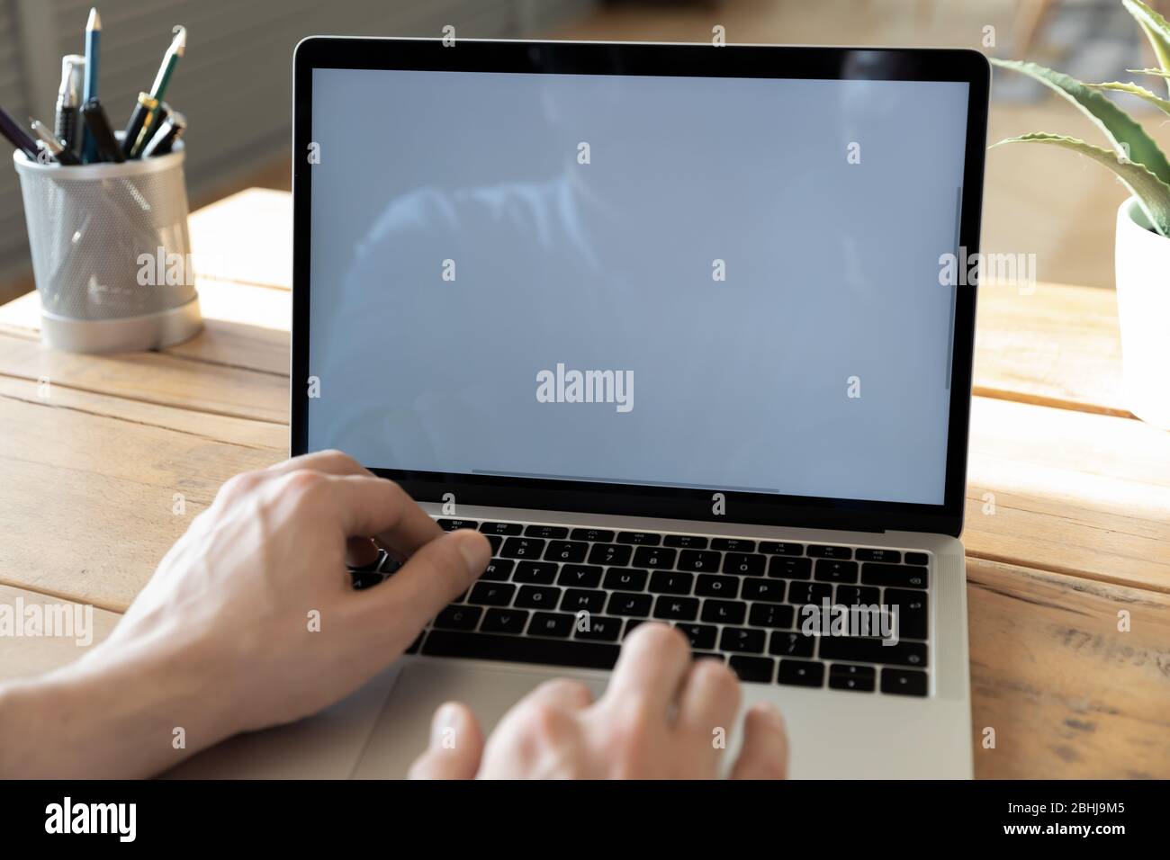 Close up businessman using laptop, white empty screen mock up Stock Photo