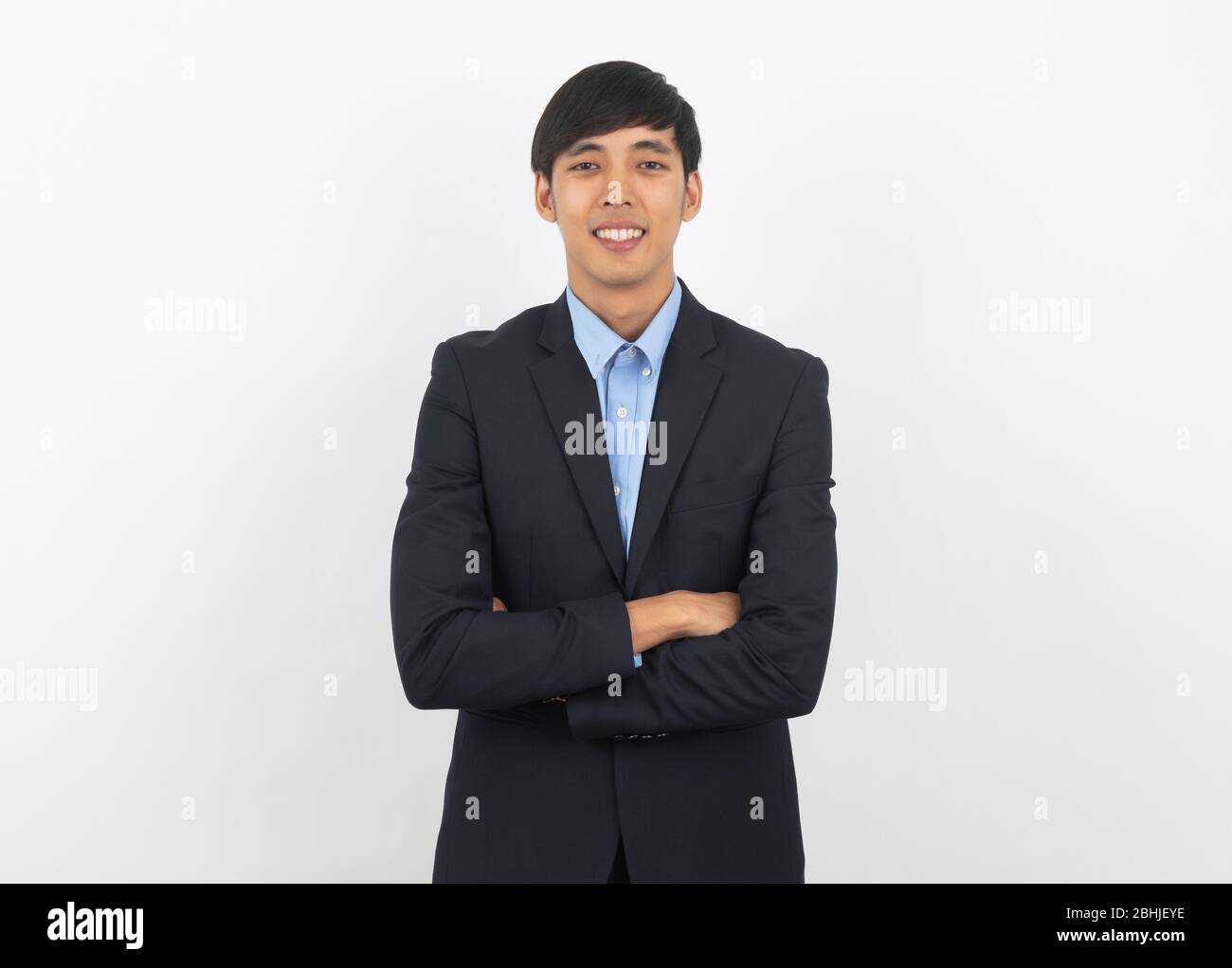 Portrait of happy smiling asian businessman in black suit isolated on ...