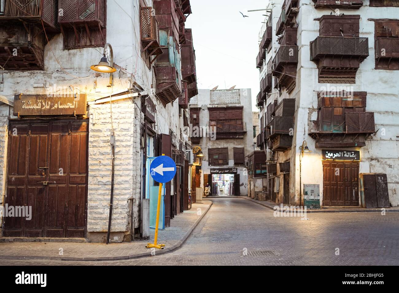Jeddah / Saudi Arabia - January 16, 2020: Night view of street of old town historic Al-Balad with wooden balconies in buildings Stock Photo