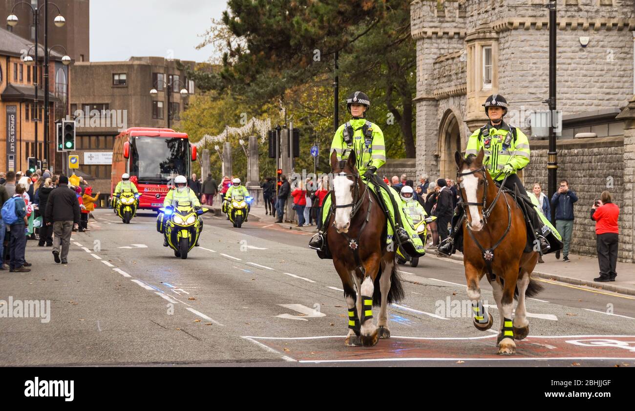CARDIFF, WALES NOVEMBER 2018 Mounted police on escort duty riding in