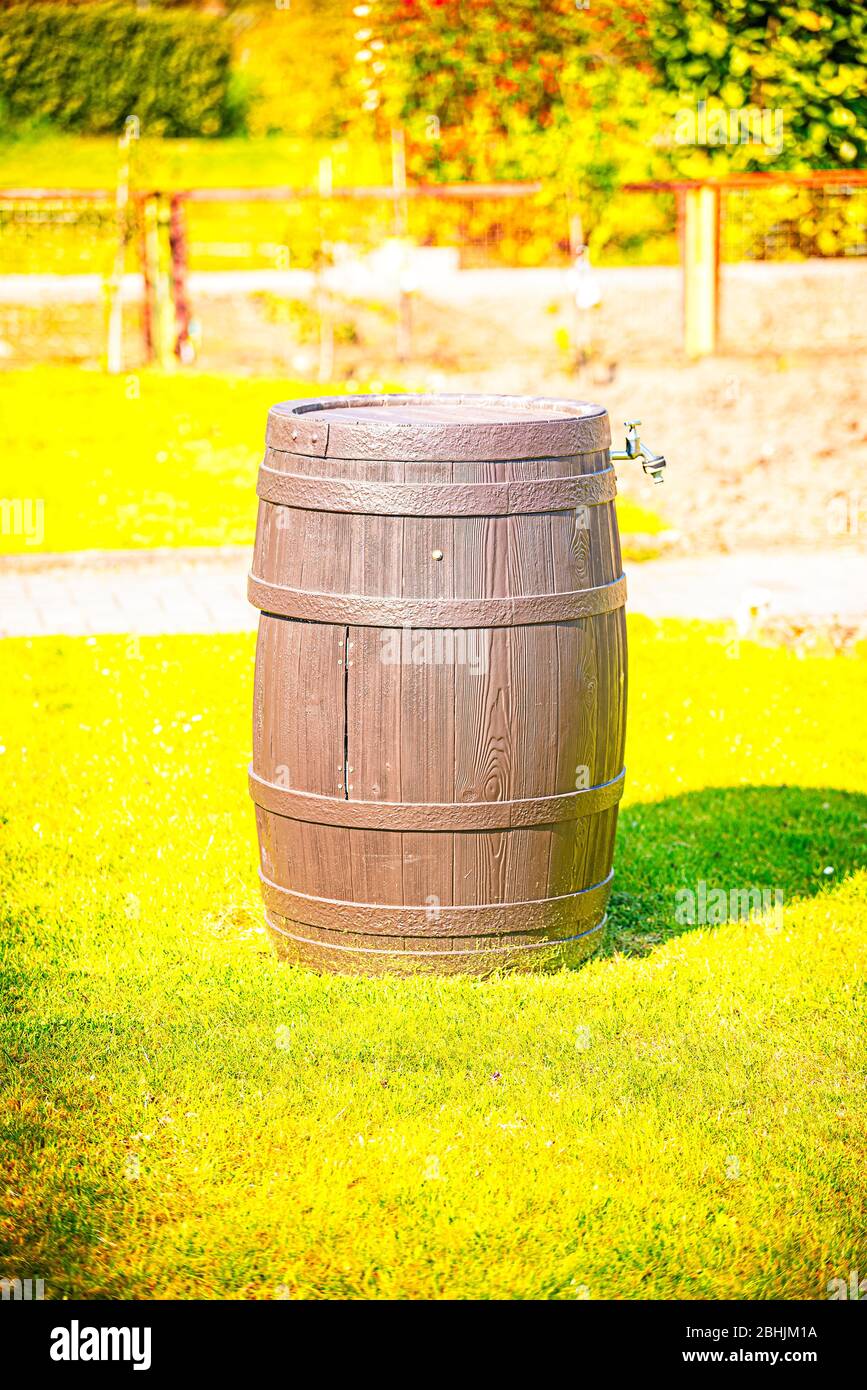 Wooden barrel in the garden Stock Photo Alamy