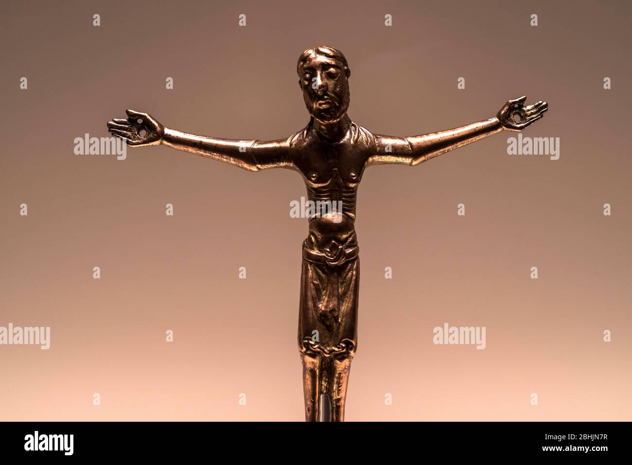 Romanesque art in the National Art Museum of Catalonia,Barcrelona,Christ (1180 AC), cast bronze, chiseled and gilded. Stock Photo