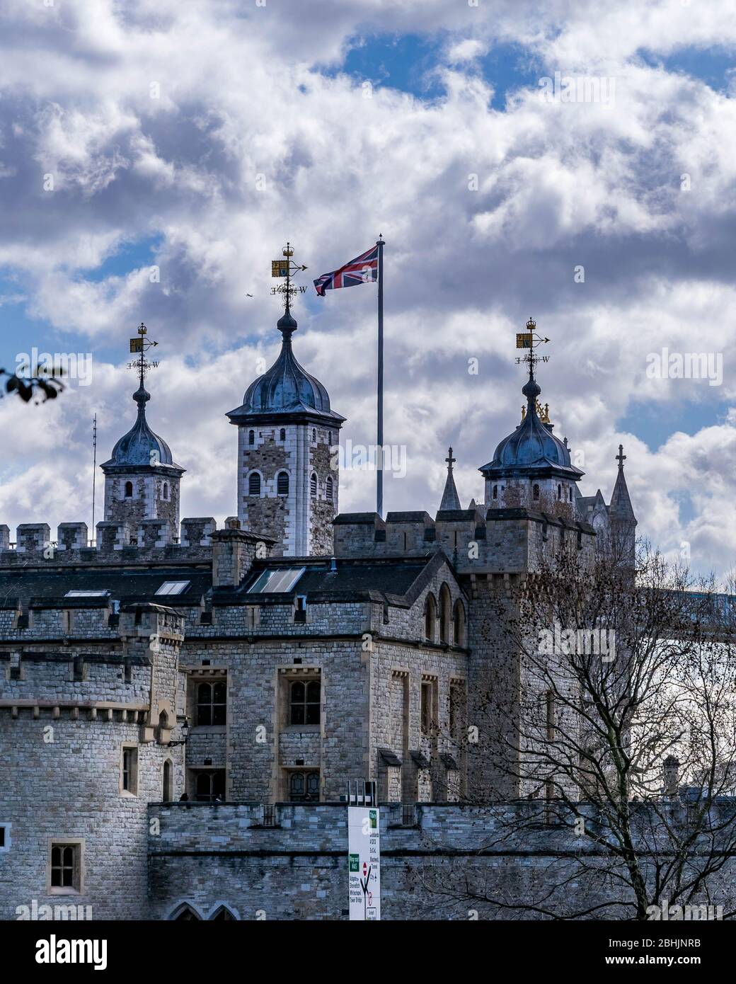 Tower of London with the British flag. Clouds over the Tower of London,UK Stock Photo