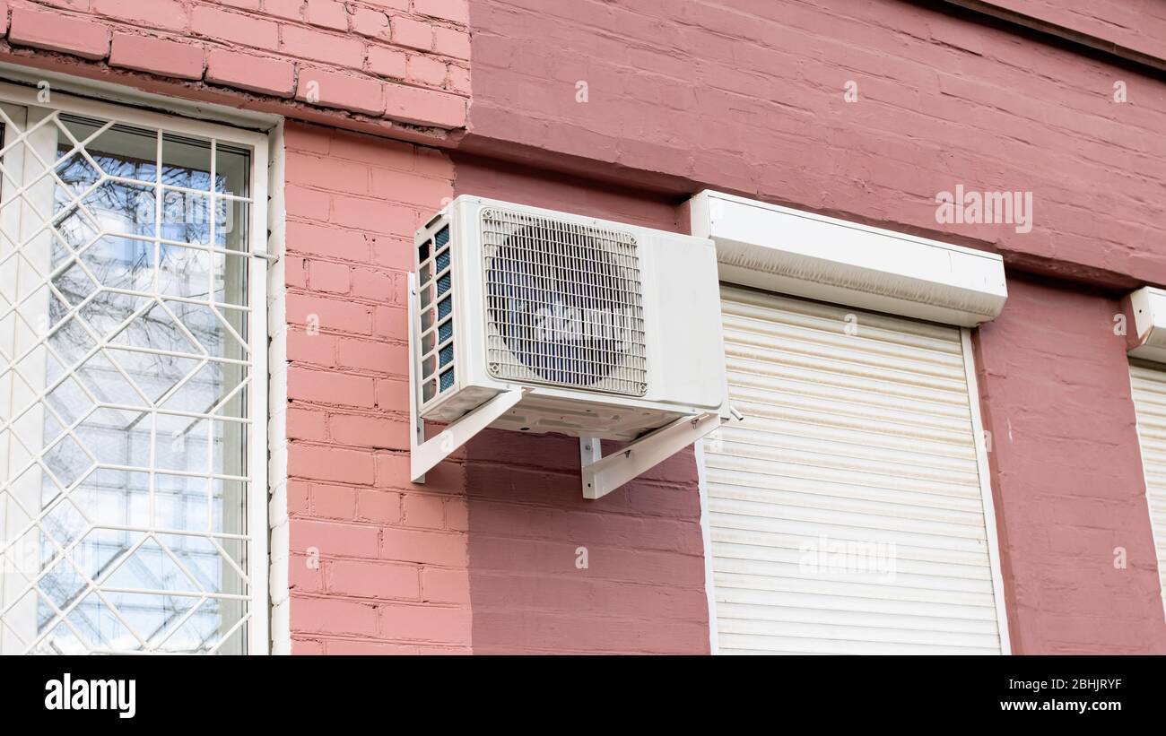 Air conditioning on red brick building wall Stock Photo Alamy