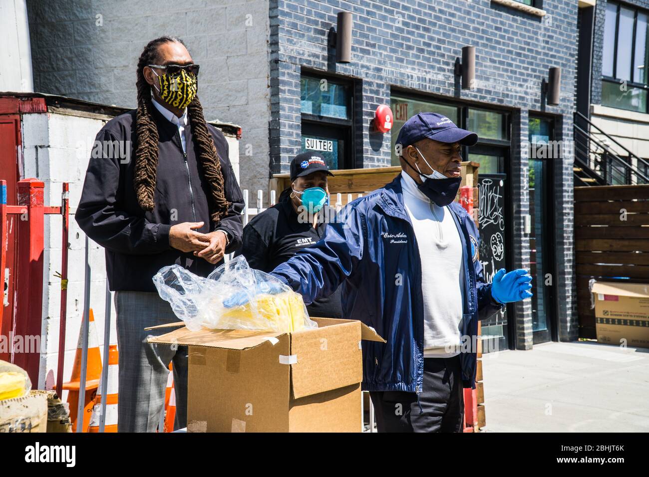 Brooklyn Borough President Eric Adams and Councilman Robert Cornegy distribute PPE to the Bed-Stuy EMS volunteer workers. Stock Photo