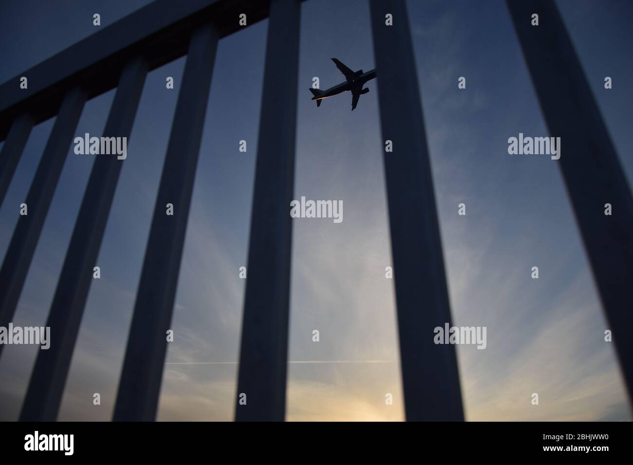 An Airplane flaying in the sky. Stock Photo