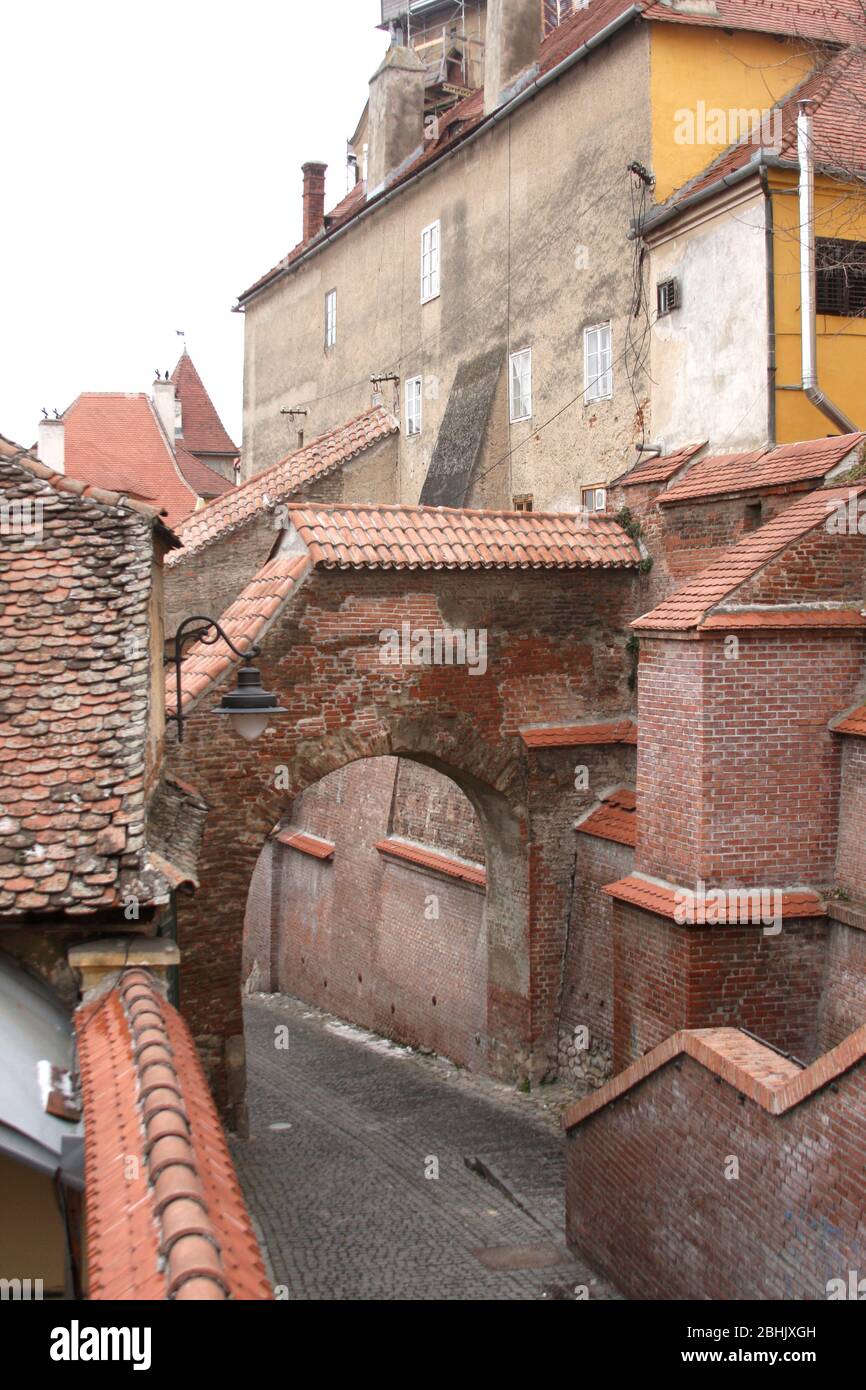Sibiu, Romania. The Stairs Passage (Pasajul Scărilor), a 13th century architectural gem, connecting the Upper Town to the Lower Town. Stock Photo