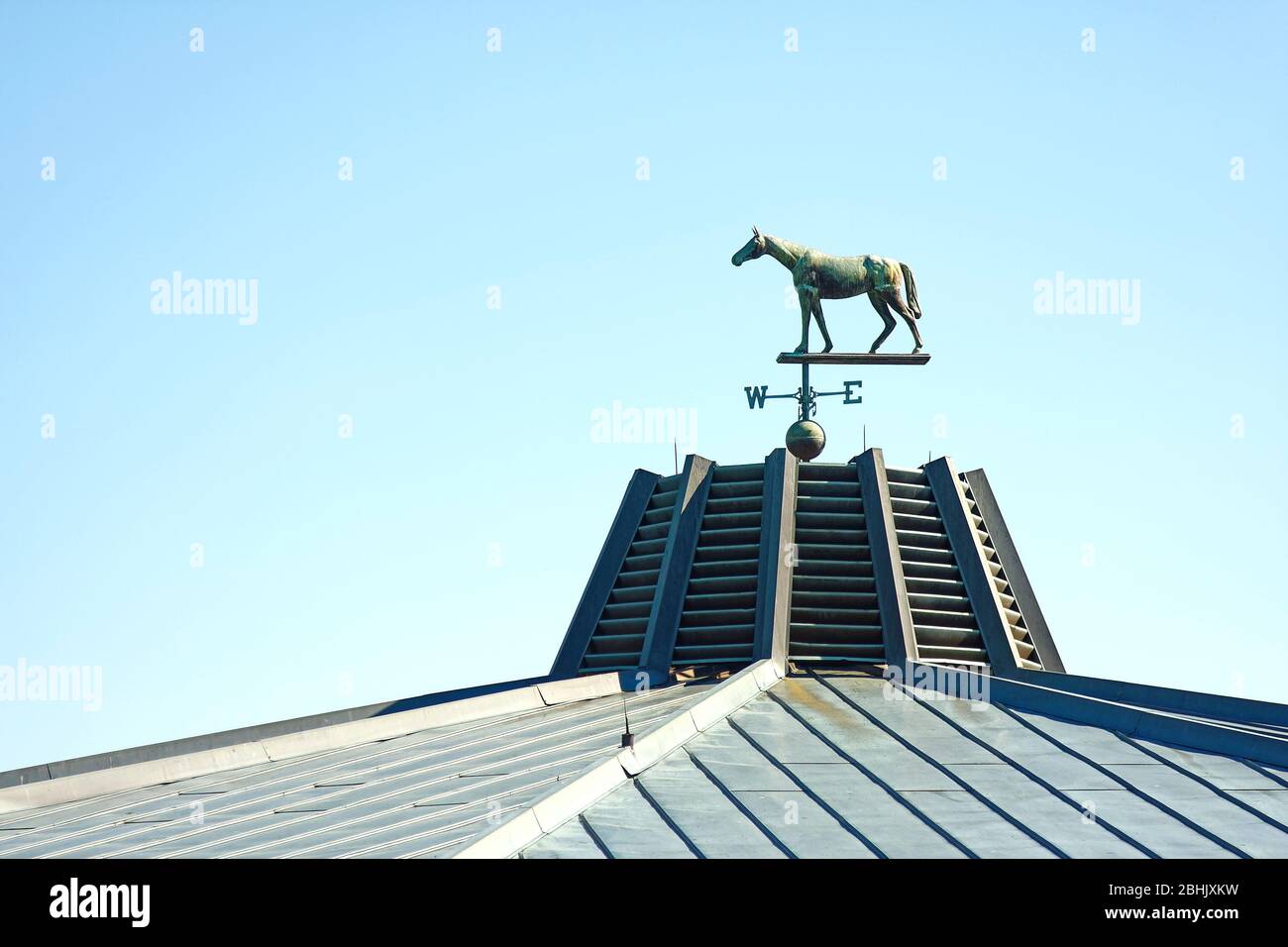 horse wind vane, on top of roof, wind direction indicator, Keeneland Racetrack; Kentucky; USA, Lexington; KY Stock Photo