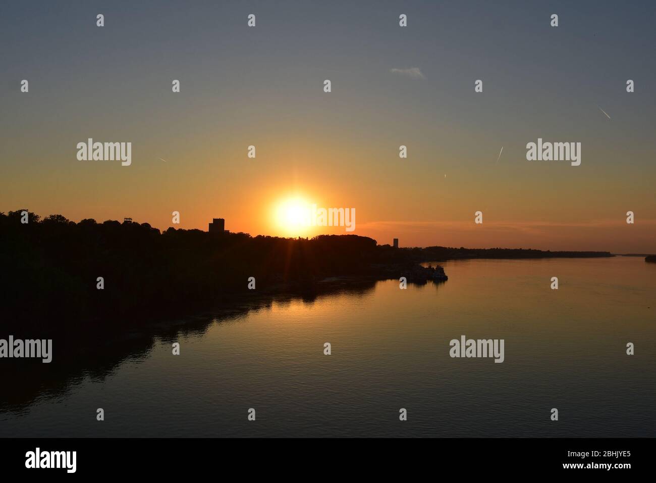 Sunset orange over the Danube River. Romantic atmosphere Stock Photo