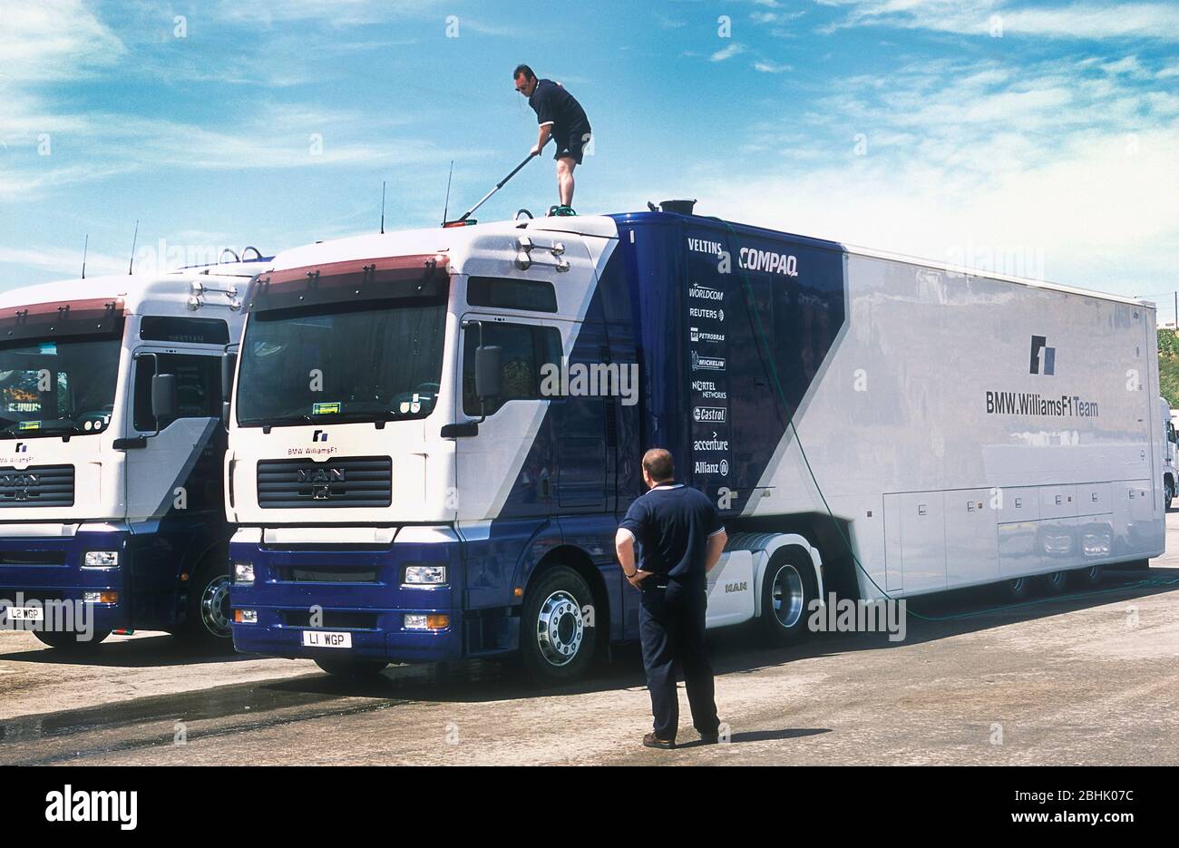 BMW Williams Formula 1 team MAN transporters driving to the 2002 Spanish GP at the Circuit de Catalunya Stock Photo