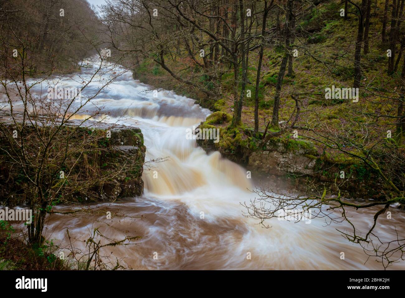 Sgwd y Bedol, the Horseshoe Falls, after heavy rain on the River Neath in waterfall country in the Brecon Beacons - beautiful long exposure Stock Photo