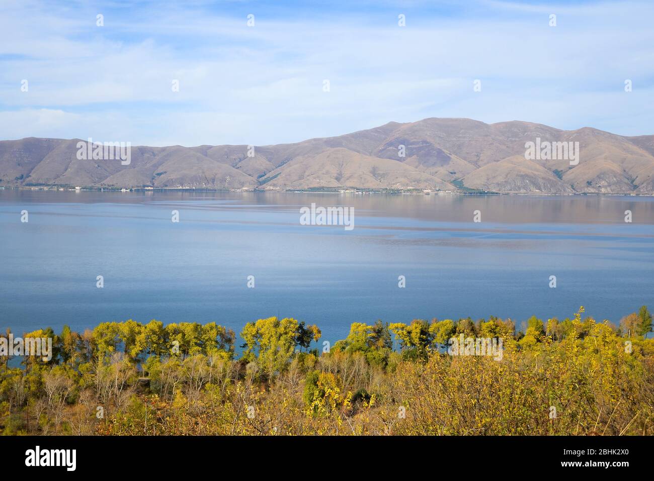Lake Sevan in Armenia with beautiful autumn colors. Largest body of water in the Caucasus region. Alpine Lake in Gegharkunik Province. Stock Photo