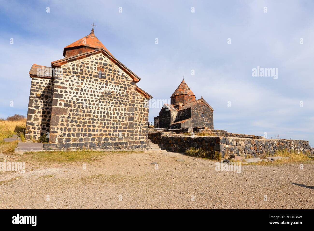 Sevan / Sevanavank Monastery in Lake Sevan peninsula, Armenia, with Holy Apostles (Surp Arakelots) and Holy Mother of God (Surp Astvatsatsin) churches Stock Photo