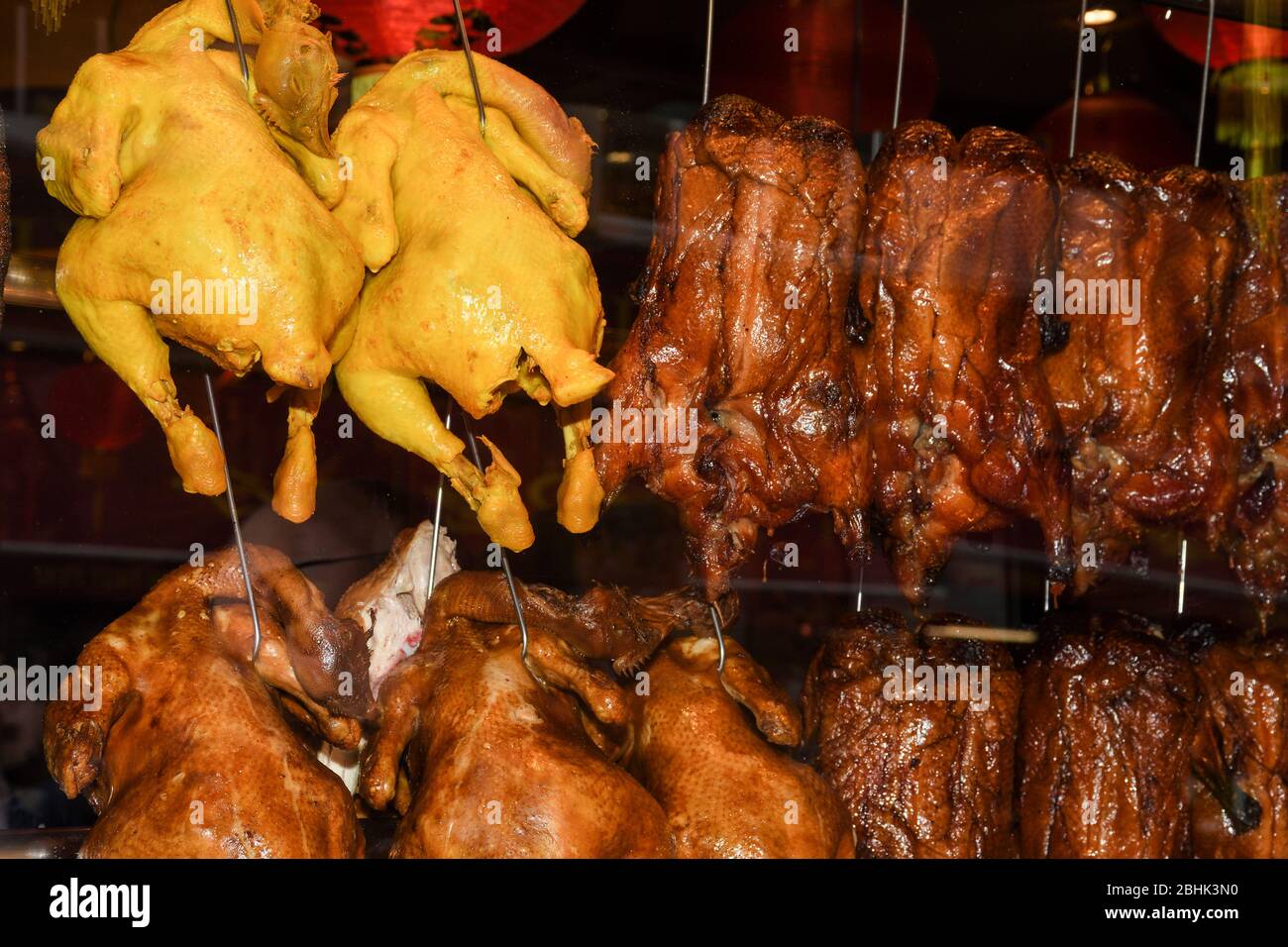 Duck Hanging Racks Roasted ducks hanging on rack showcase in restaurant's kitchen Stock ...