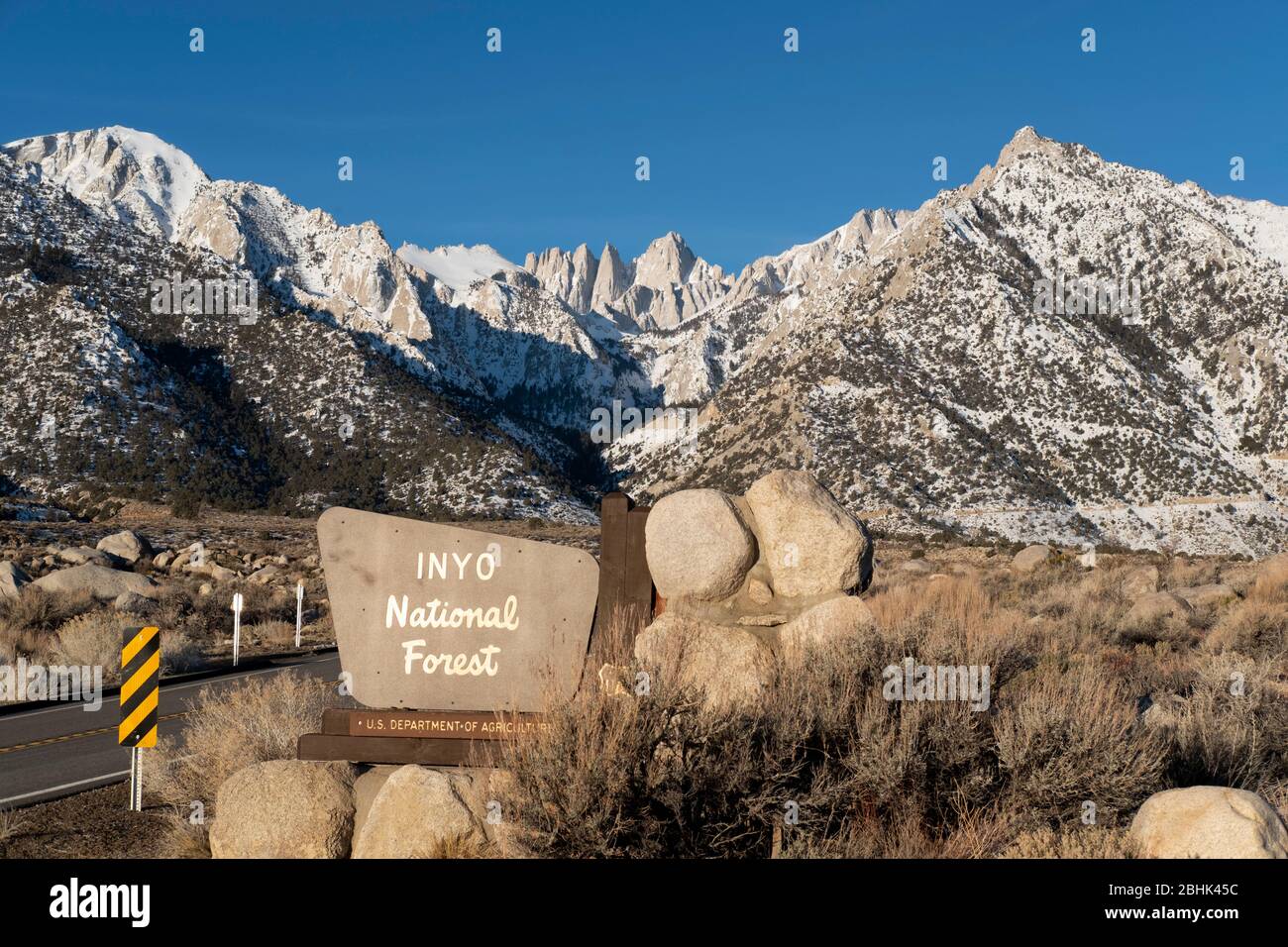 Sign marking the entrance to the Inyo National Forest near Lone Pine approaching Mount Whitney, California Stock Photo