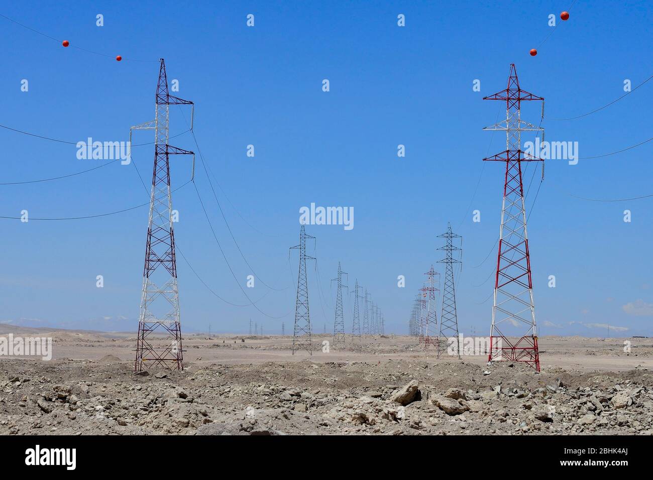 High voltage pylons in the Atacama Desert, Chuquicamata, Antofagasta region, Chile Stock Photo