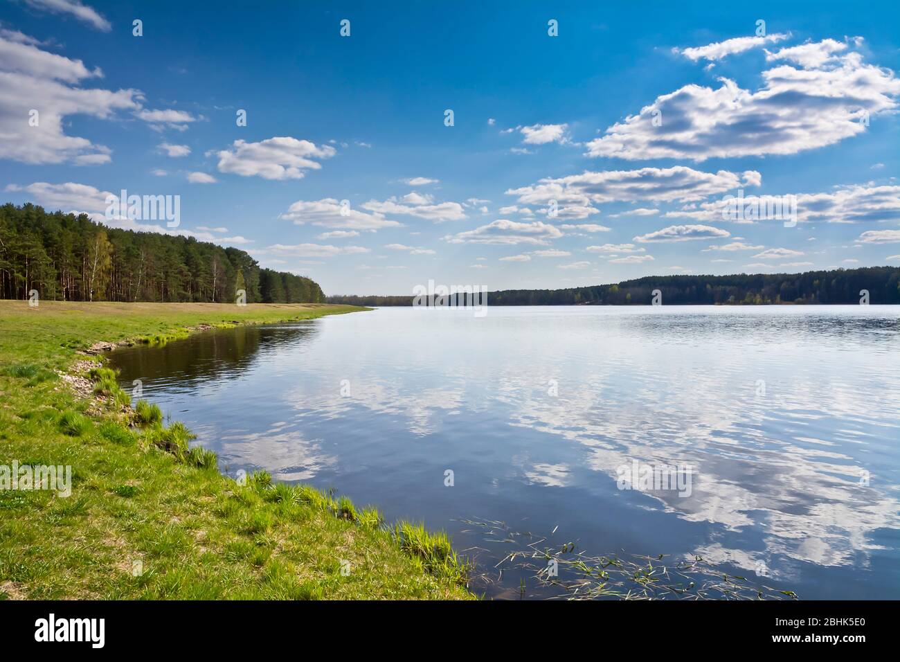 Summer landscape with lake and blue sky Stock Photo - Alamy