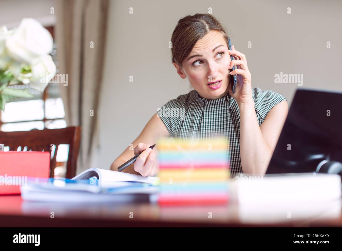 Businesswoman cannot tolerate working from home any longer Stock Photo