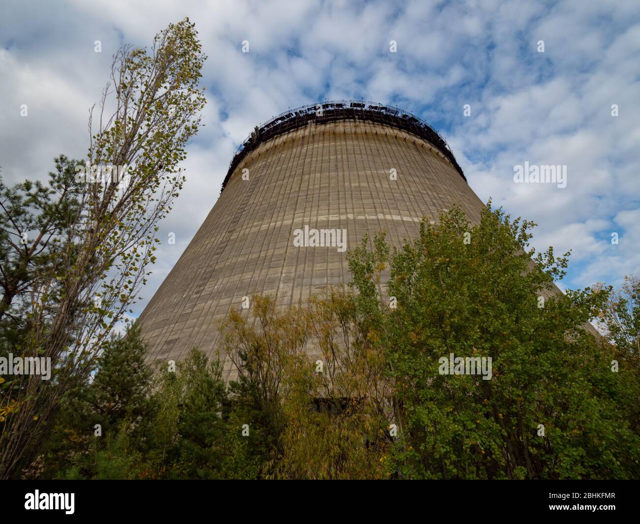 Unfinished cooling tower in Chernobyl zone at afternoon, fall season ...
