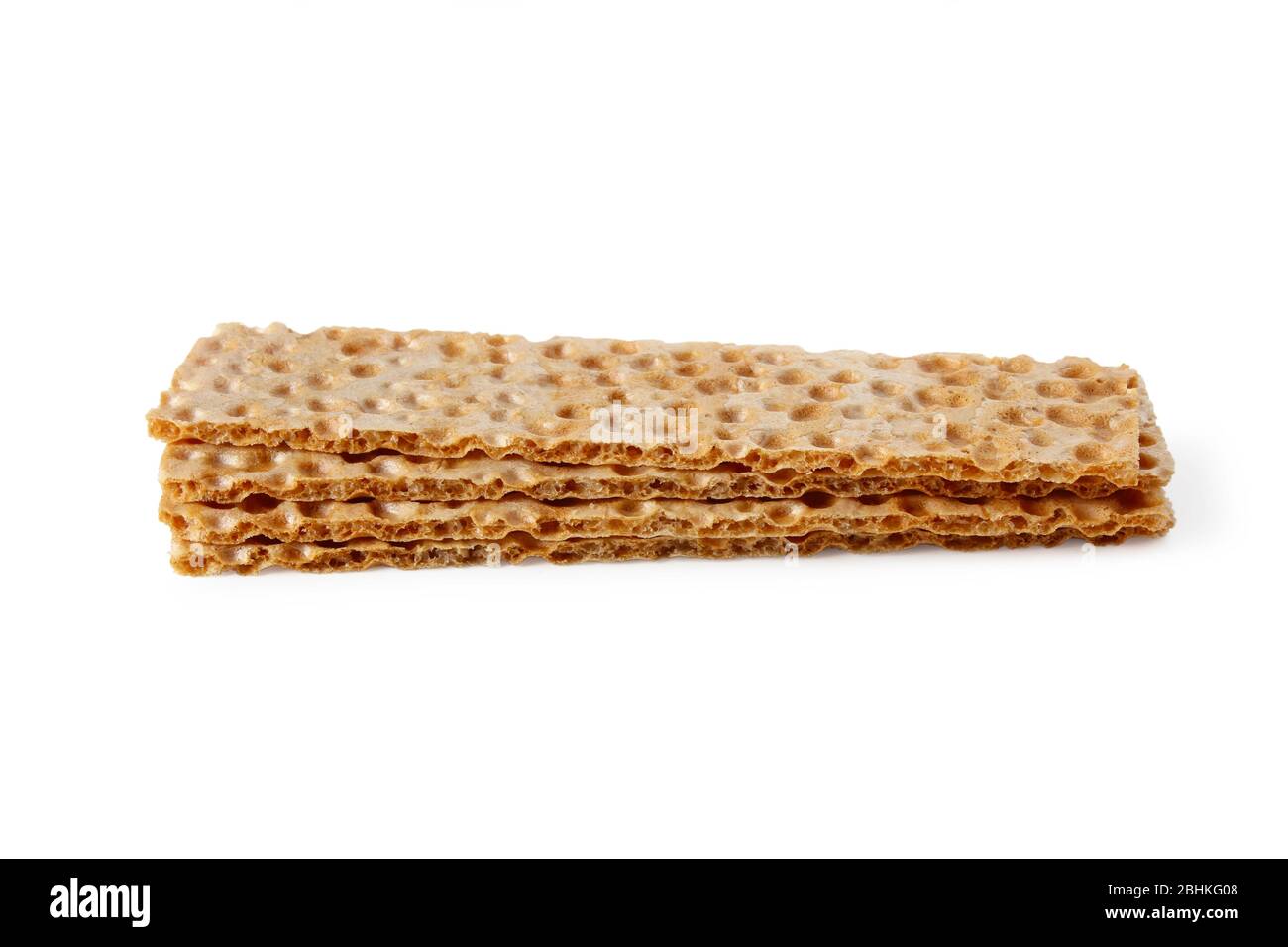 Stack of wheat crackers isolated on white Stock Photo