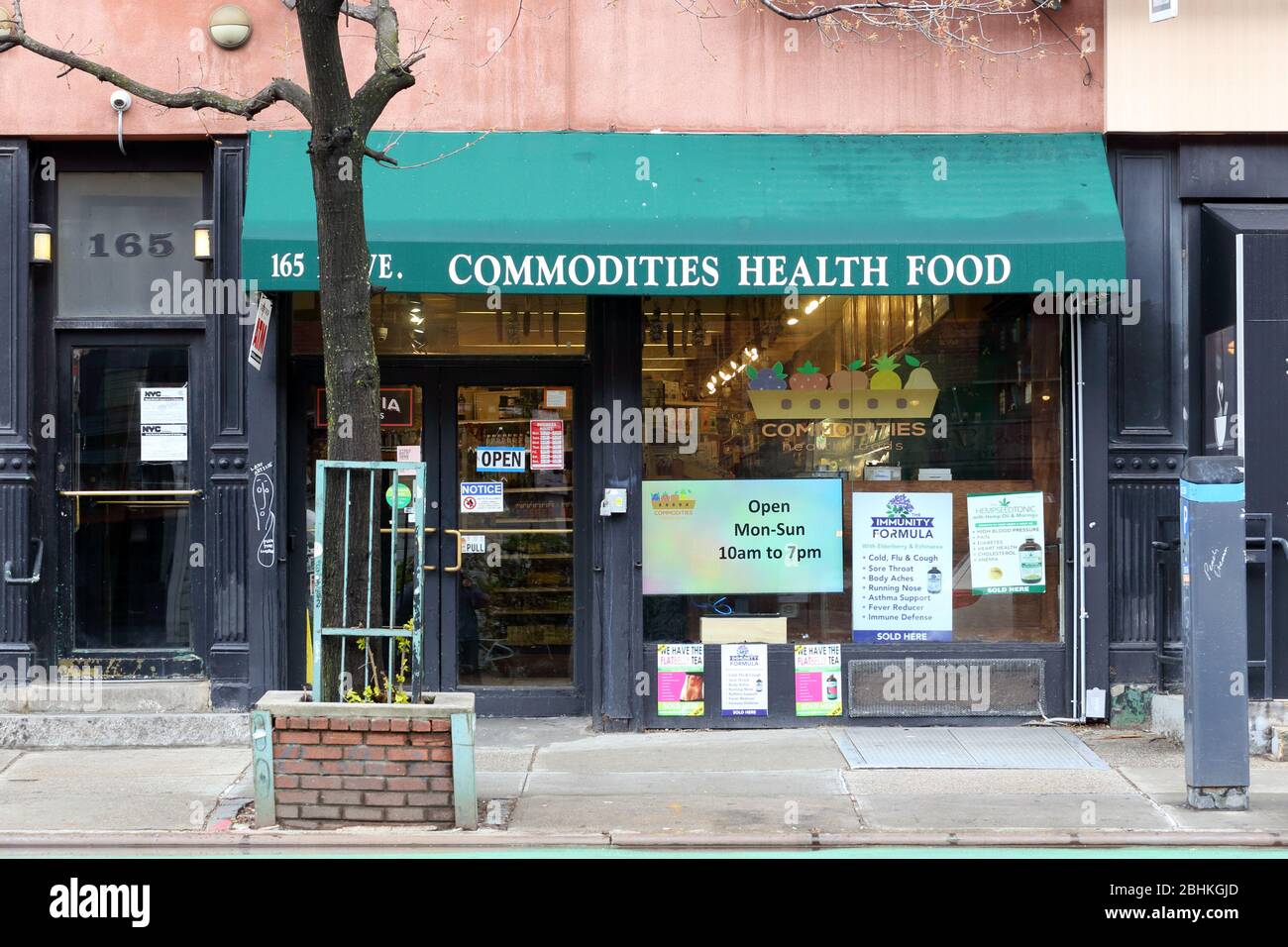 Commodities Health Food, 165 1st Avenue, New York, NY. exterior storefront of an organic health food store in Manhattan's East Village. Stock Photo