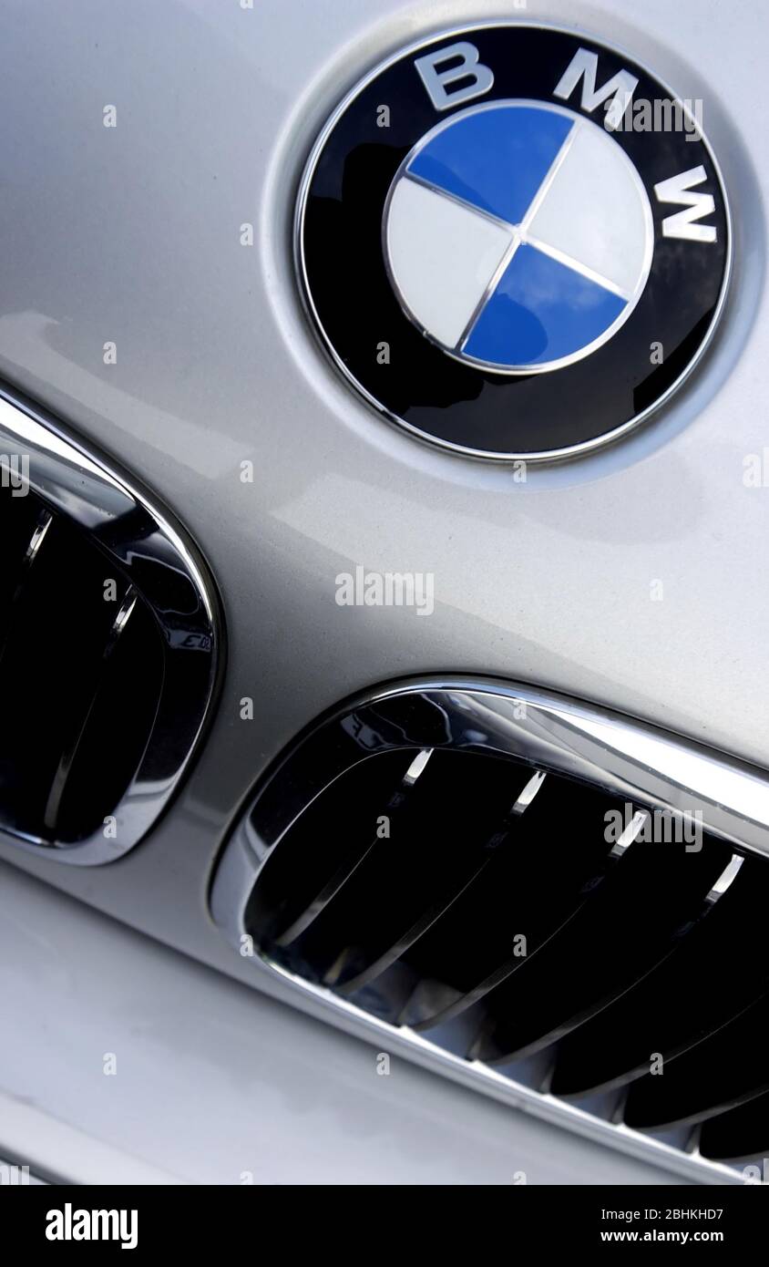 Picture shows the badge and grille of a BMW vehicle. Stock Photo