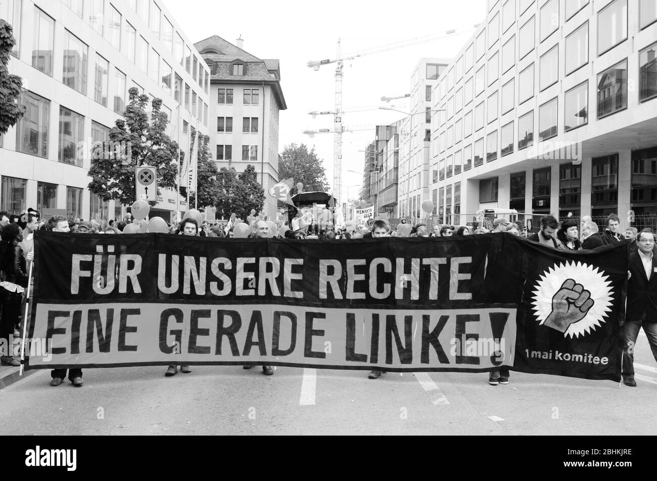 "For our rights a leeft wing punch" is written on the poster of the protestors at national labour day Stock Photo