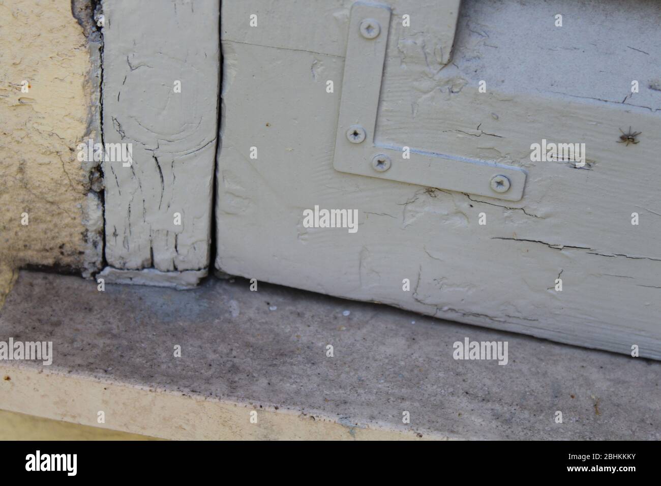 close up on the corner of a painted wooden door frame Stock Photo