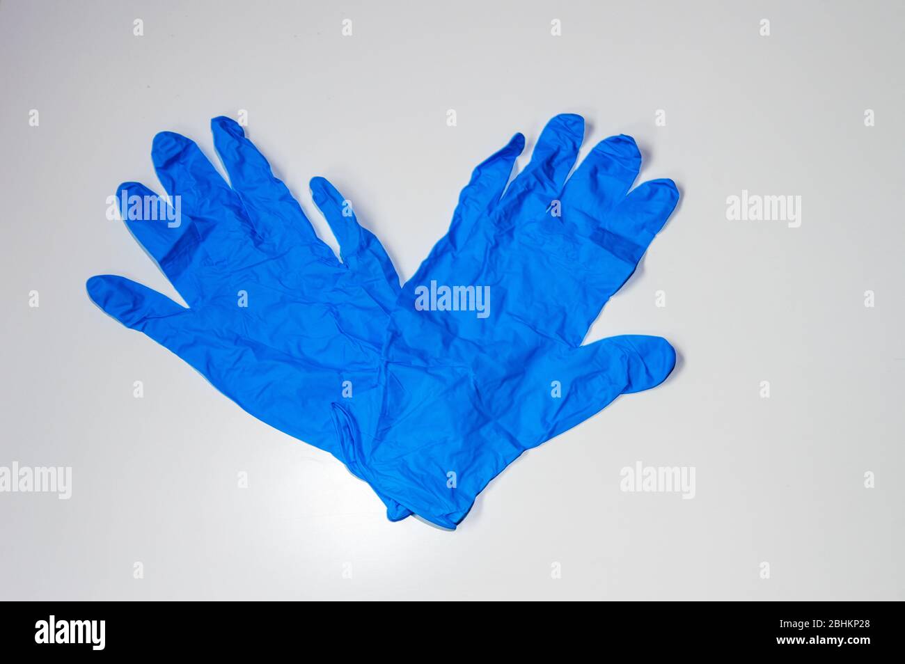 Blue Gloves Used As Individual Protective Equipment To Not Get Covid-19. Also Known As Coronavirus. Stock Photo