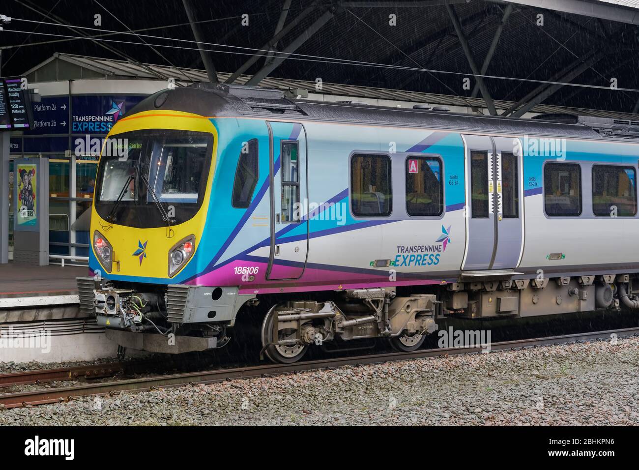 Manchester UK airport train stopped at station. Transpennine Express at