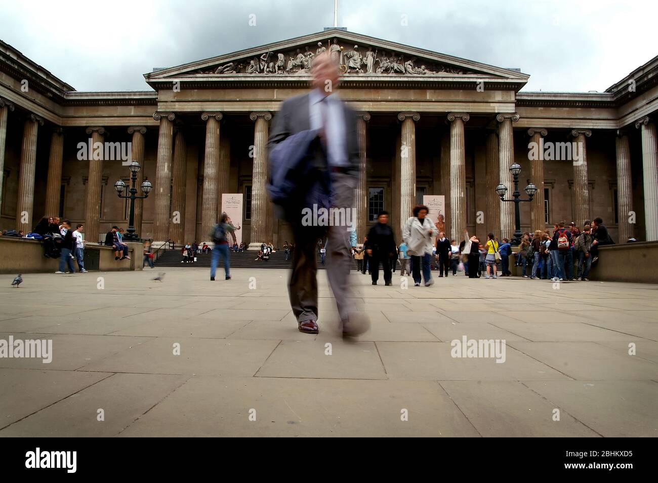 A smart suited man leaving the British Museum. Stock Photo