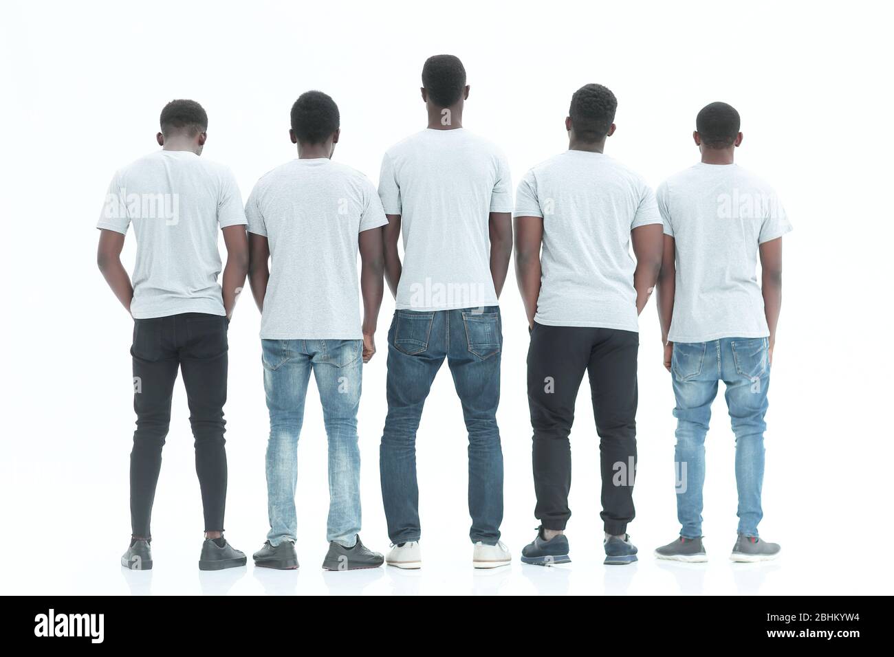 rear view. group of guys looking at white blank screen Stock Photo - Alamy