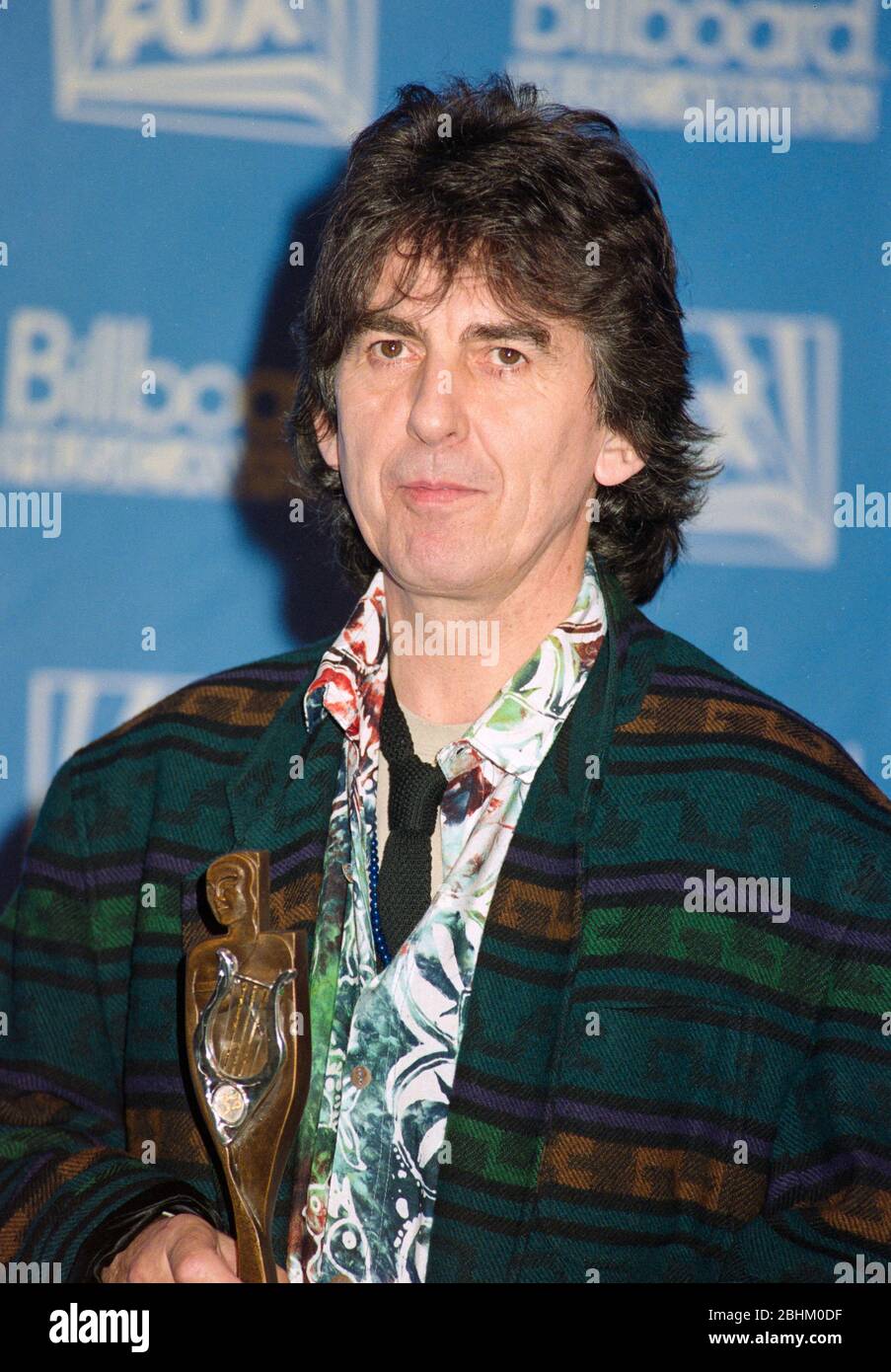 LOS ANGELES, CA. c.1994: Former Beatle George Harrison.  File photo © Paul Smith/Featureflash Stock Photo