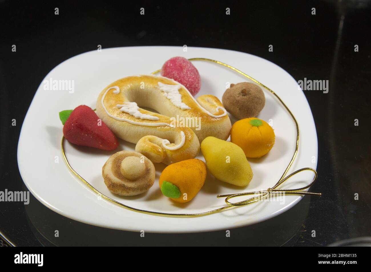Close-up of a plate with typical Valencian sweets to celebrate the day of San Dionisio, on October 9 Stock Photo