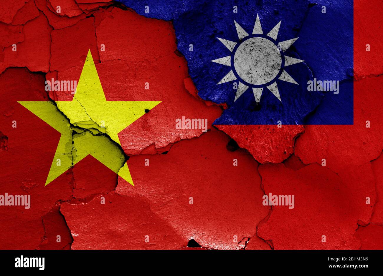 flags of Vietnam and Taiwan painted on cracked wall Stock Photo